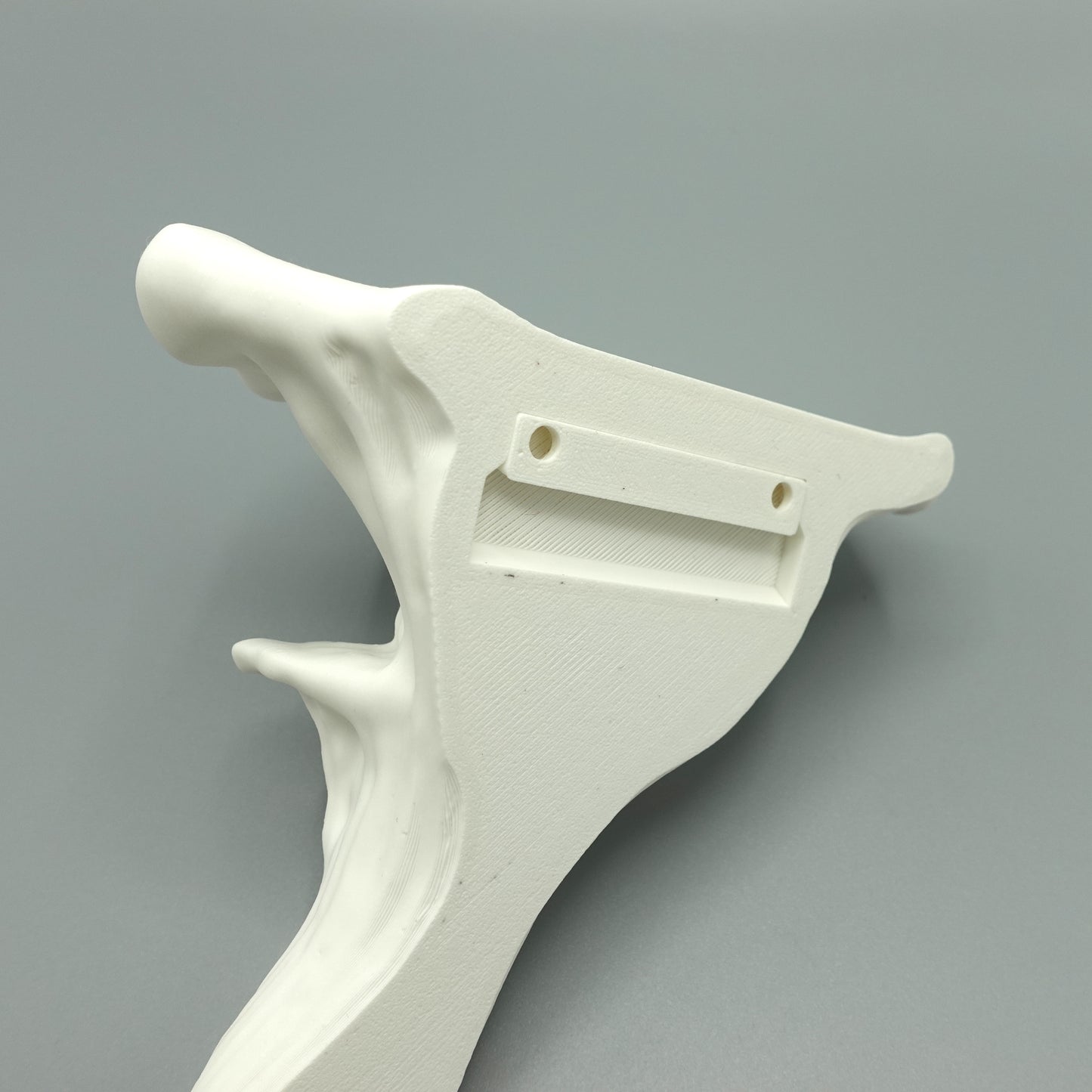 Close-up of a 3D printed white Mushroom Floating Shelf, designed for elegant home organization.