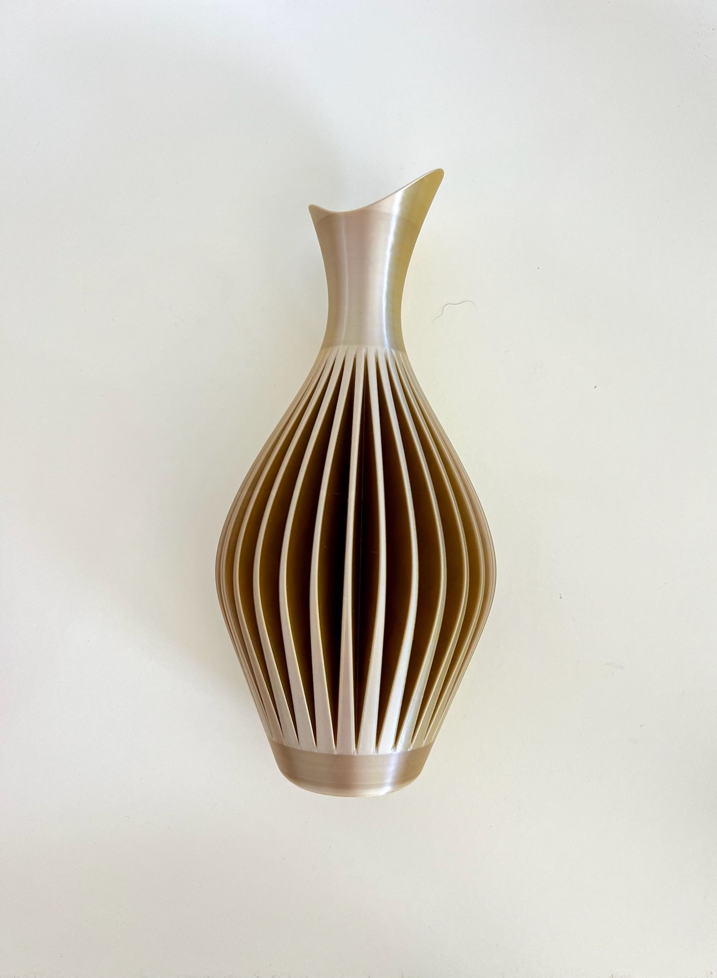 Elegant light beige wall vase featuring a beautiful floral arrangement, designed for wall mounting.