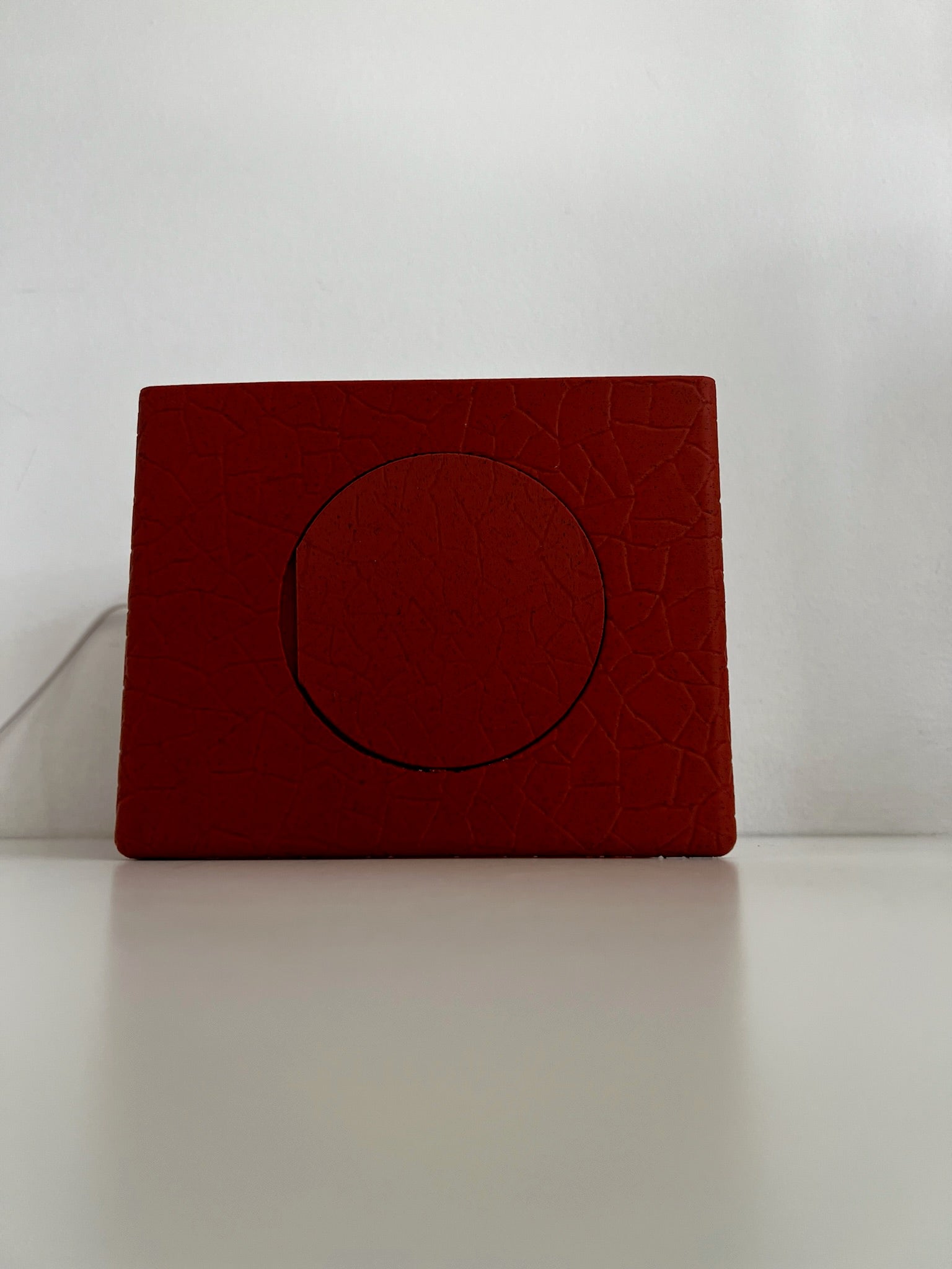 Brightly lit Ancient Marble Bookend featuring a contemporary design and an inviting glow.