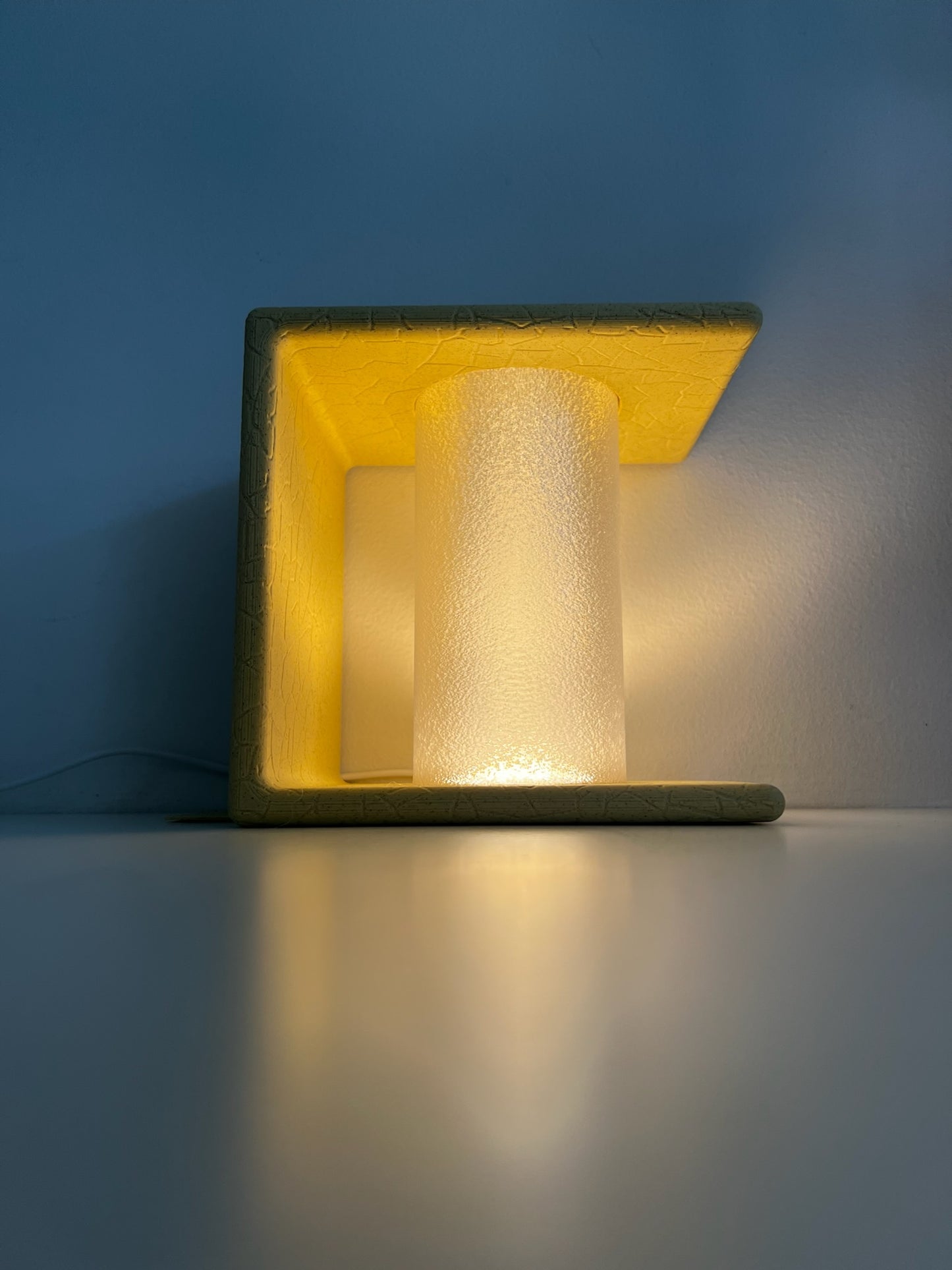 Softly glowing Ancient Marble Bookend creating an inviting ambiance around it.
