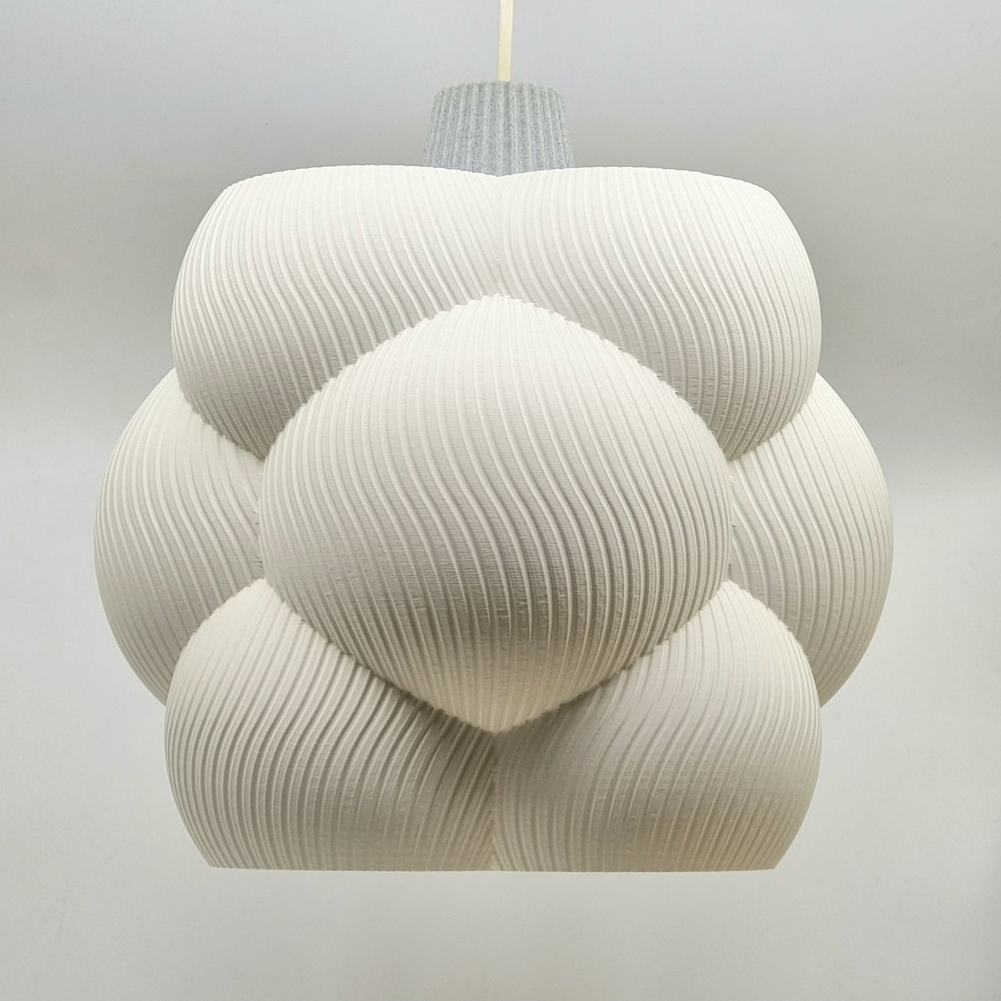 Cumulus Cloud lampshade in a stylish setting, displaying its unique shape and shadow play, ideal for contemporary home decor.