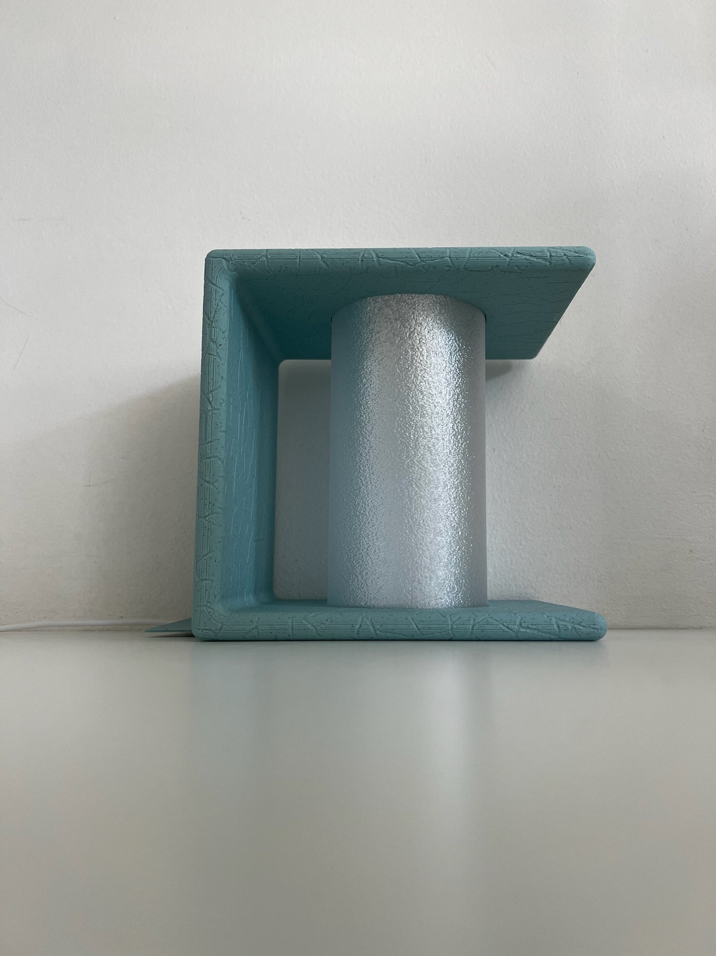 Atmospheric lighting cast by an Ancient Marble Bookend, perfect for creating a relaxed vibe.
