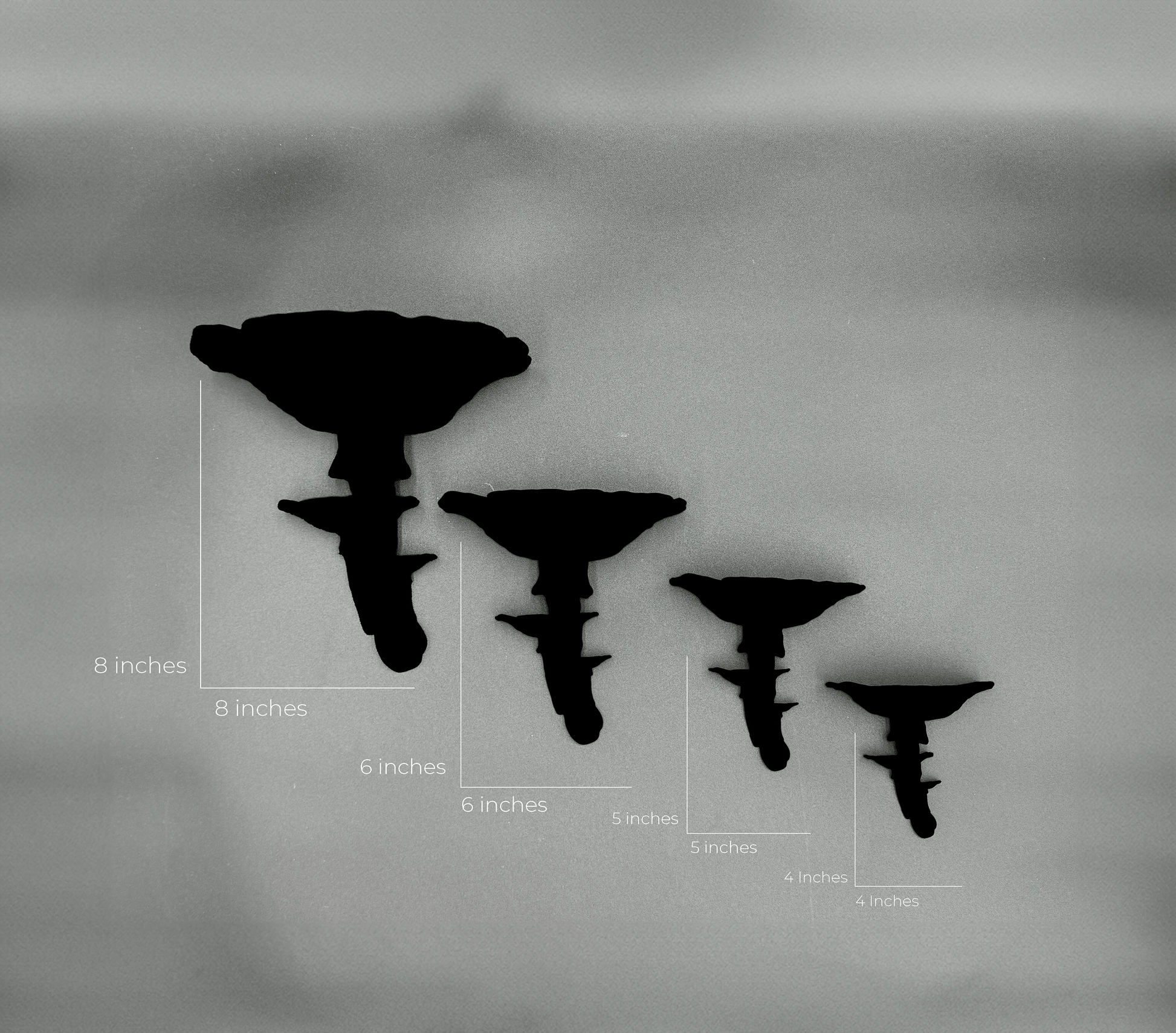 Silhouette of Amanita mushroom floating shelves with measuring indicators for sizes, showcasing 8-inch, 6-inch, and 5-inch variants.