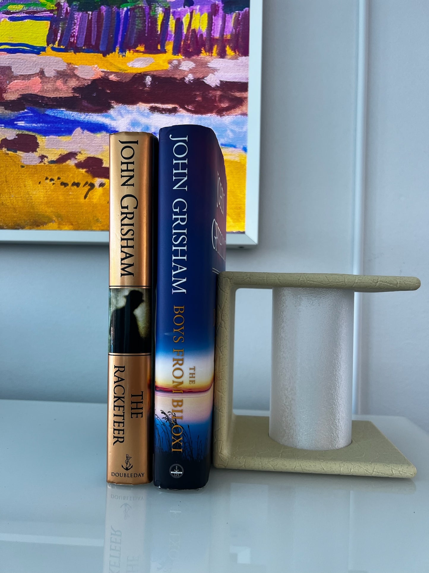 Modern-style Ancient Marble Bookend illuminated to highlight its unique texture.