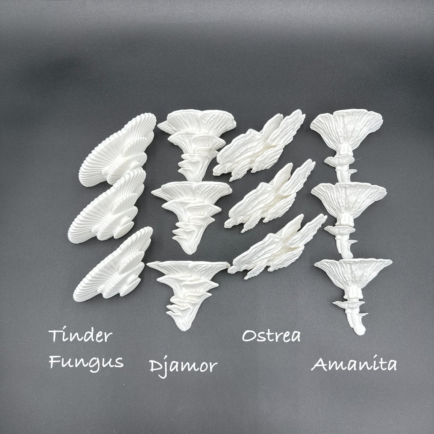 Collection of white fungus-shaped shelves including various designs, displayed creatively against a black background.