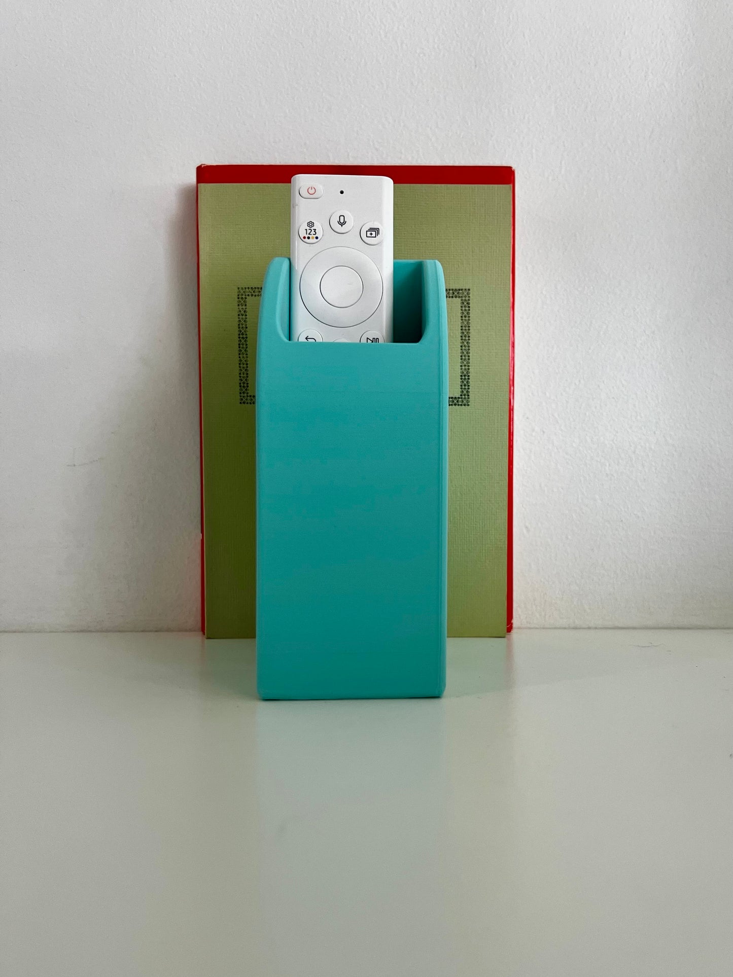 Colorful desk display featuring multiple organizers and books, showcasing a combination of pastel hues for a lively office atmosphere.