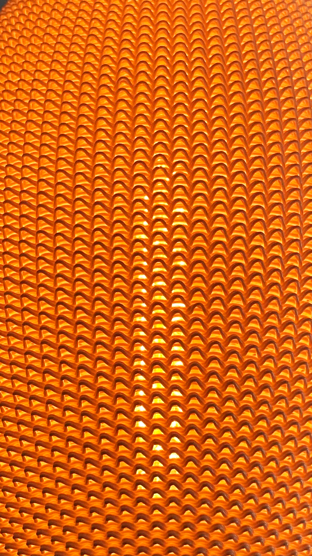 Detailed image of the Ovo Lampshade texture showing intricate patterns and warm glow, perfect for enhancing interior styles.