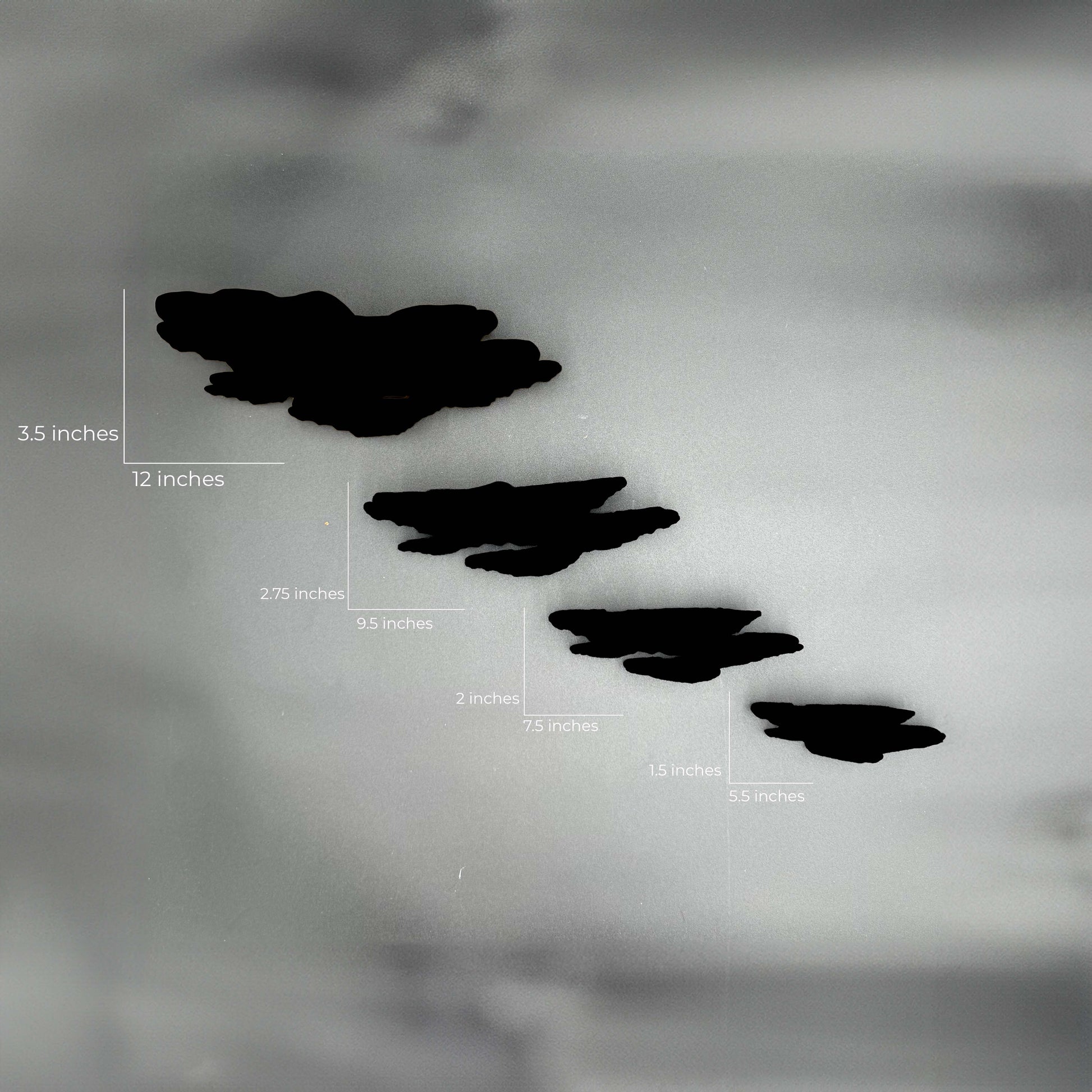 Measurement guide for the Ostrea Mushroom Floating Shelves displayed against a monochrome background, indicating sizes from small to large.