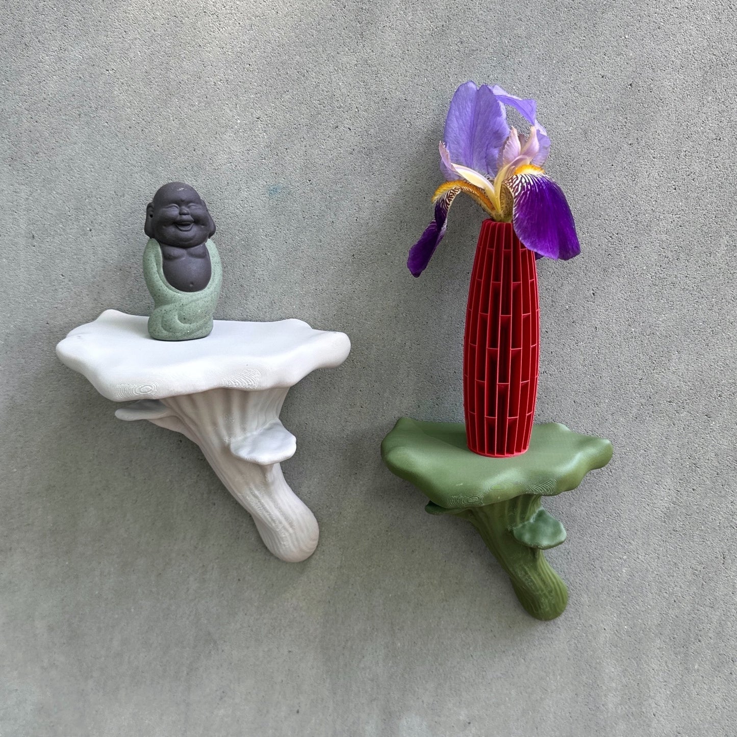 Artistic display of Oyster Floating Shelves featuring colorful decorations, including a smiling Buddha figurine and a floral vase, showcasing unique mushroom-inspired home decor.