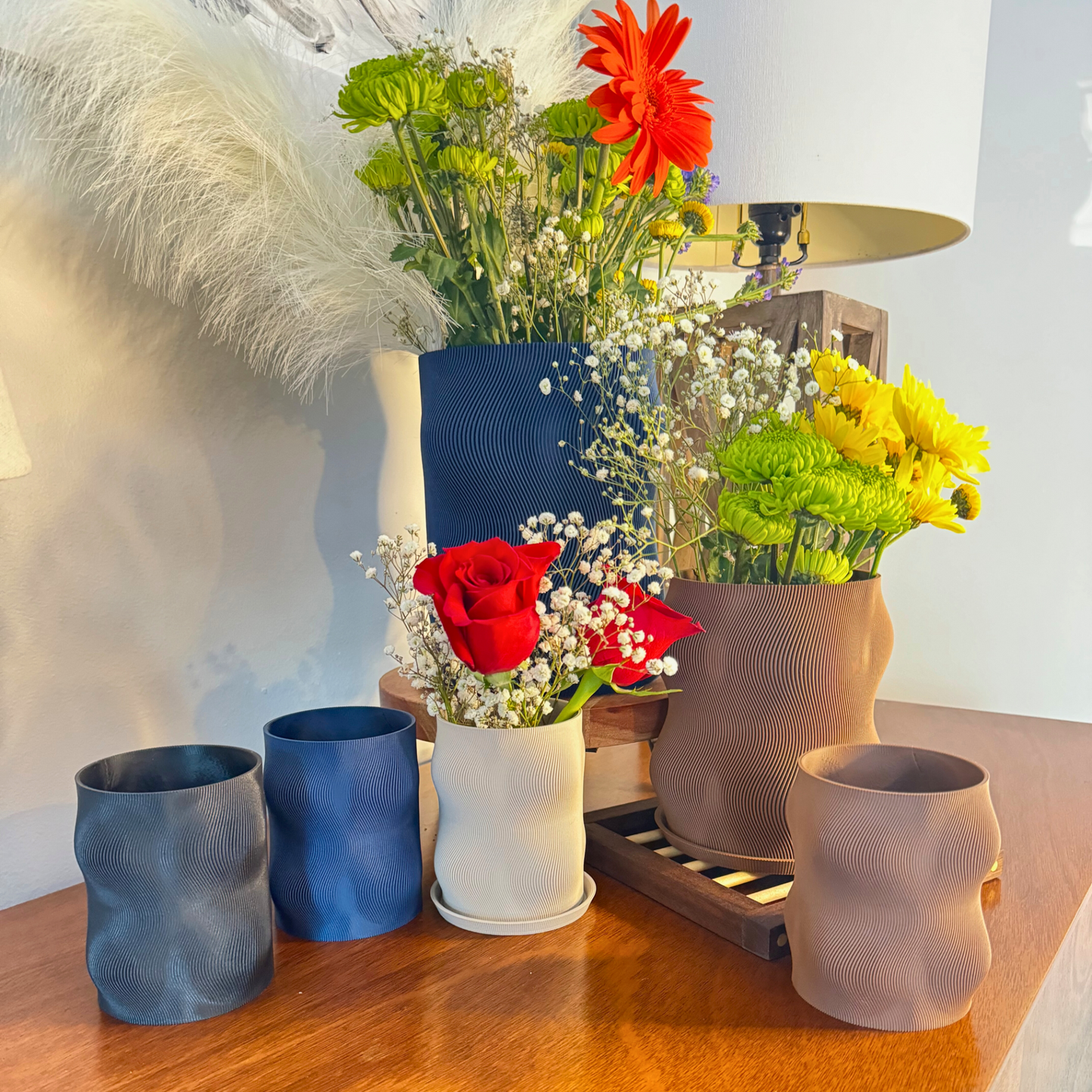 Versatile Curvy Modern Planter featuring a drainage hole, ideal for any room decor.