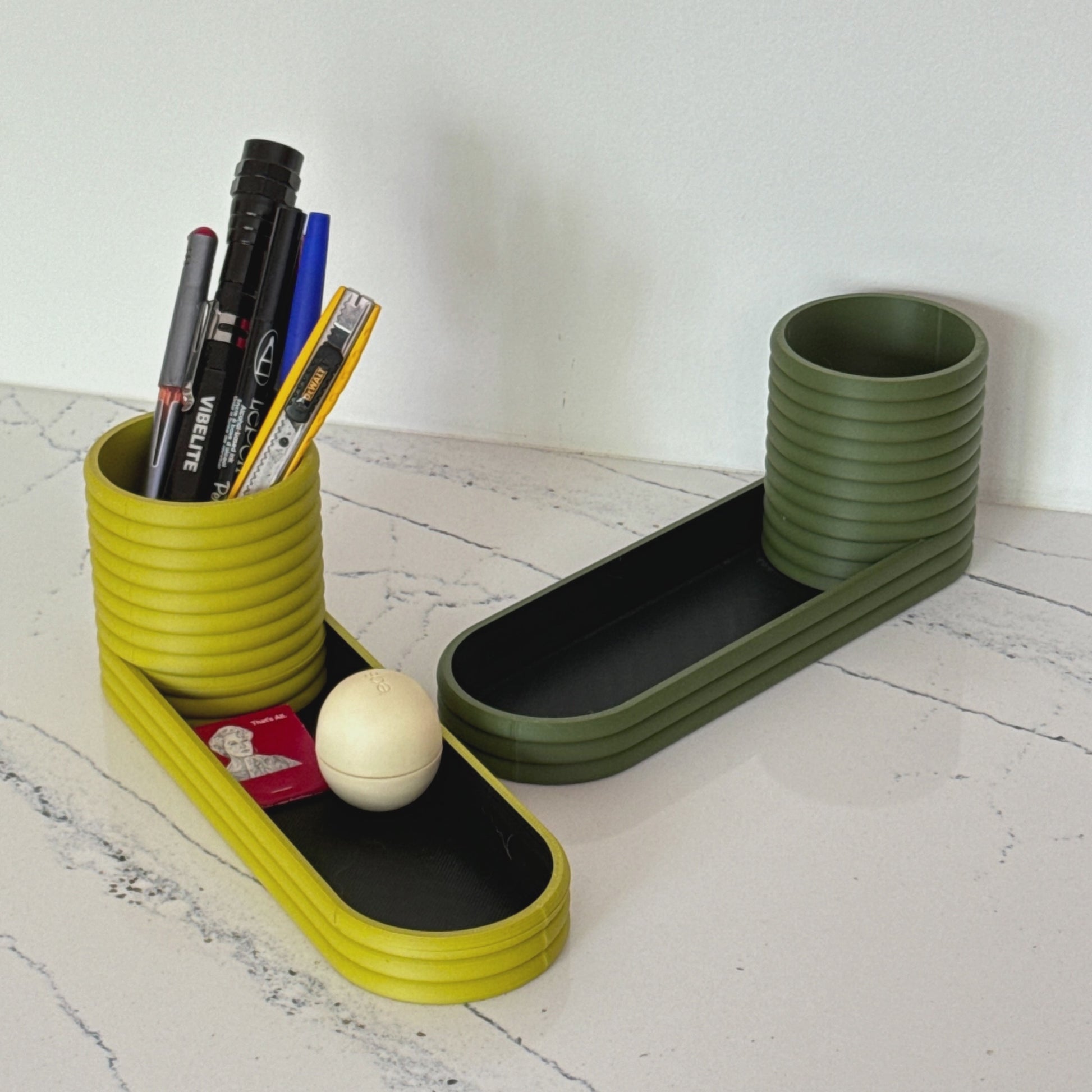 This elegant and durable mini planter doubles as a catch-all tray, bringing a touch of organization and style to any space.