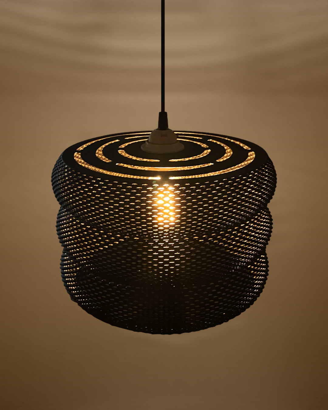 Mara Lampshade displayed in a bright setting, emphasizing its unique structure and texture for contemporary interiors.