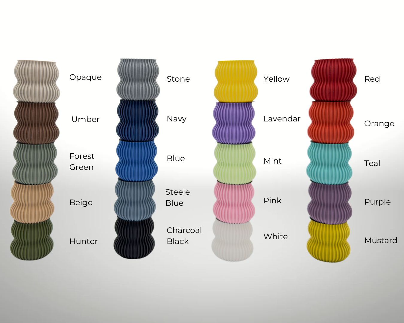 Stack of colorful ribbed vases in various shades, including navy, yellow, and lavender, arranged for display.