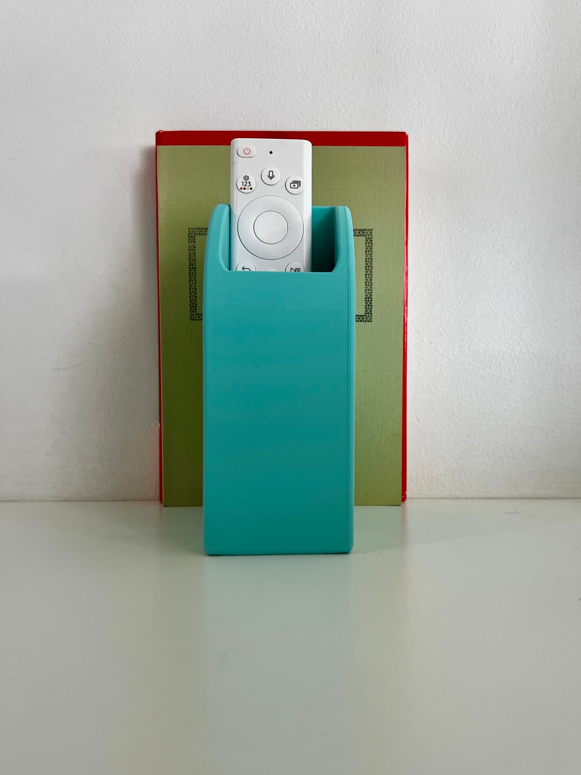 Colorful desk display featuring multiple organizers and books, showcasing a combination of pastel hues for a lively office atmosphere.