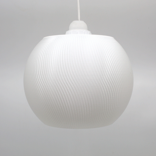 Modern white lampshade with a textured surface, perfect for adding a whimsical touch to home decor.