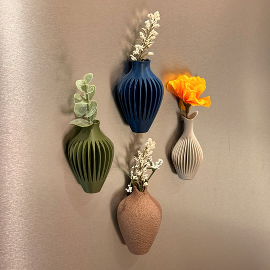 Mini Magnetic Vase Trio ‚Äì Set of 3 Modern Fridge Vases, featuring four unique designs attached to a magnetic surface, ideal as a Refrigerator Magnet Vase for small flowers or decorative purposes.