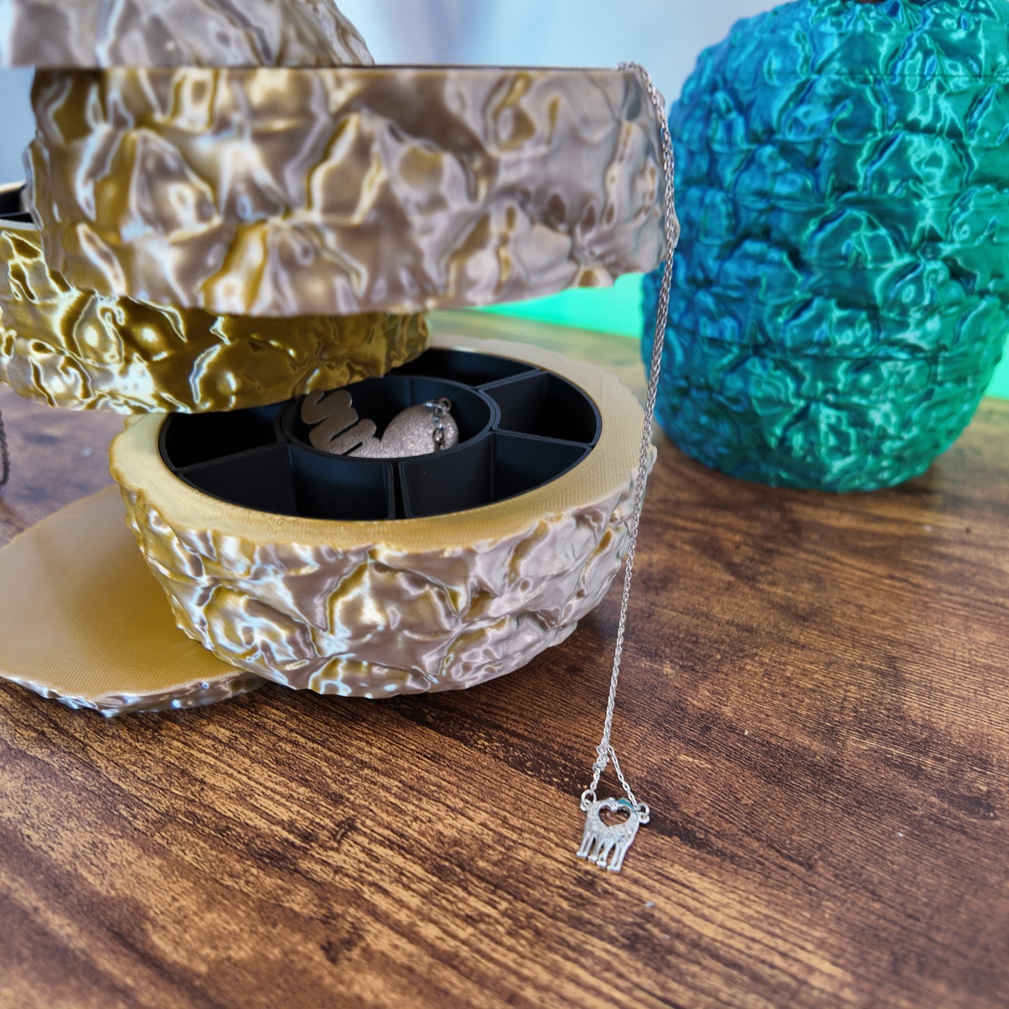 Sliced Pineapple Organizer | Rotating Jewelry Storage | Unique Desk Organizer | Home Decor Gift - Close-up view of a gold slice from the pineapple desk organizer, showcasing its functionality and tropical design for jewelry storage.