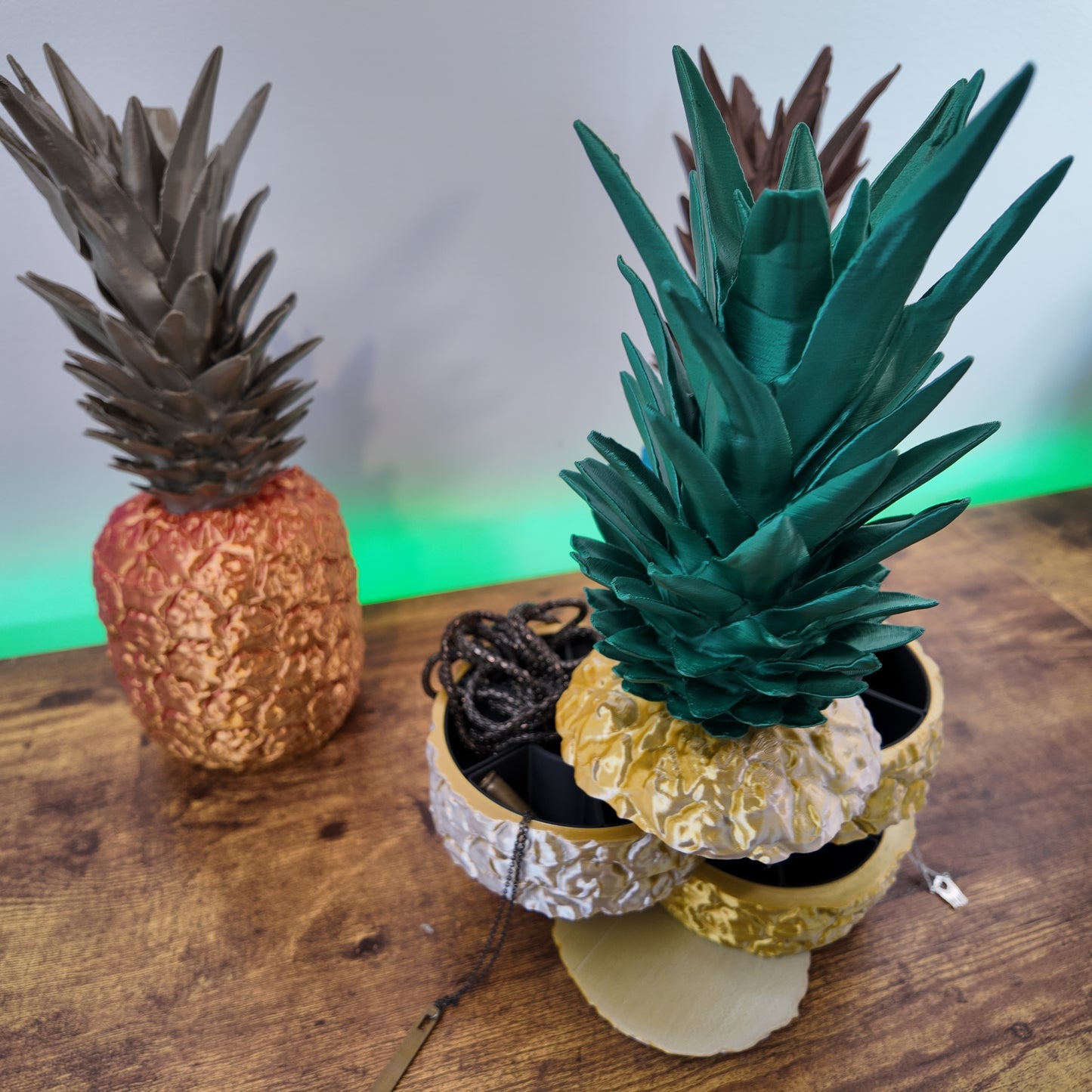 Sliced Pineapple Organizer | Rotating Jewelry Storage | Unique Desk Organizer | Home Decor Gift - Pineapple desk organizer in use, with a necklace displayed, demonstrating its practical and fashionable appeal.