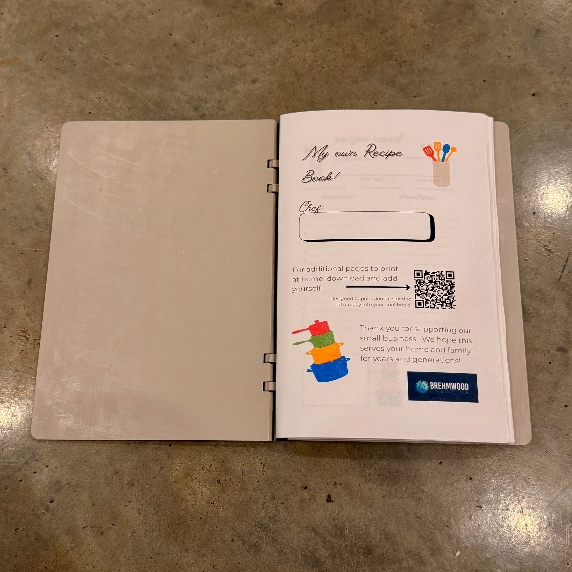 The inside cover of the 'I Am Writing My Own Cookbook' featuring a blank page titled 'My own Recipe Book' with space for personal touches, designed for culinary creativity.