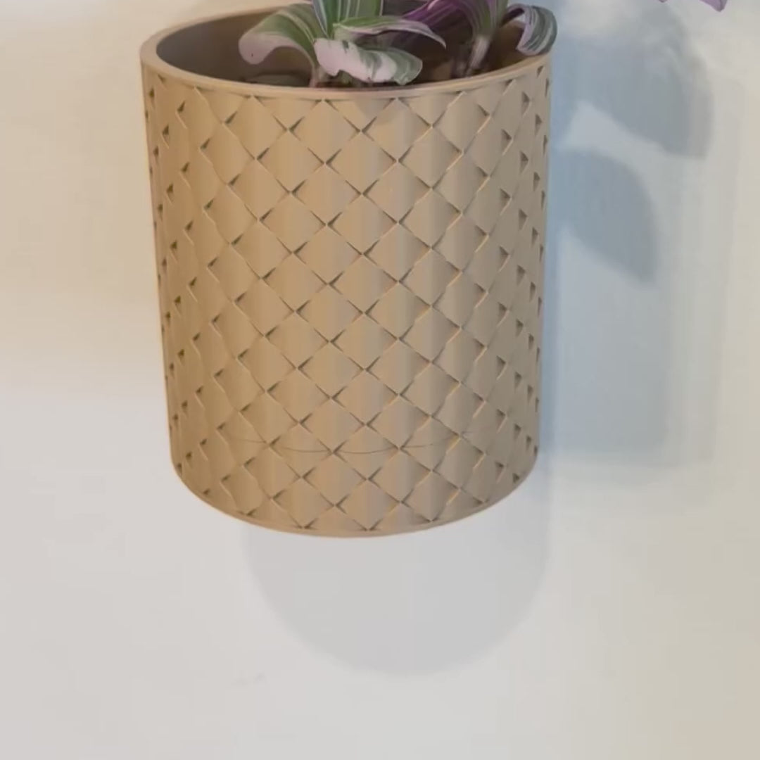 Transform your space with a beautifully designed quilted wall planter, where greenery meets modern sophistication.