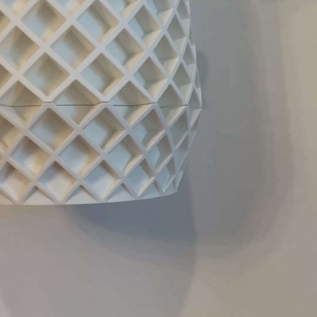 Elevate your plant display with a functional and elegant wall planter, designed to blend seamlessly into modern interiors.
