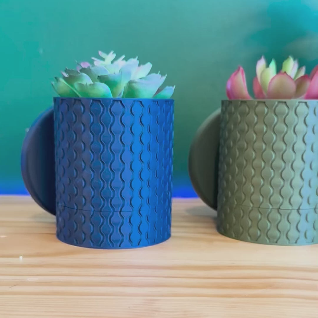 A unique raindrop-inspired planter that seamlessly combines form and function, perfect for enhancing your indoor space with a touch of nature.